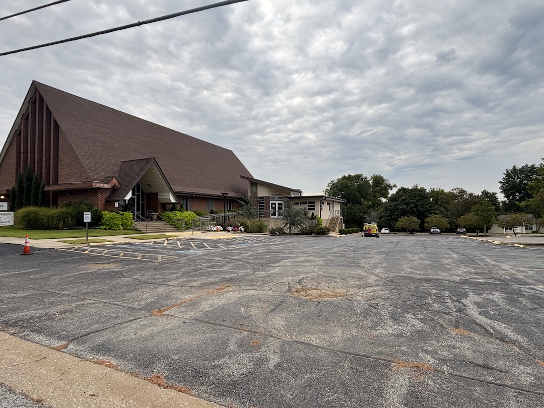 Genesis Church Crack Sealing project photo 1 in Fayetteville, AR