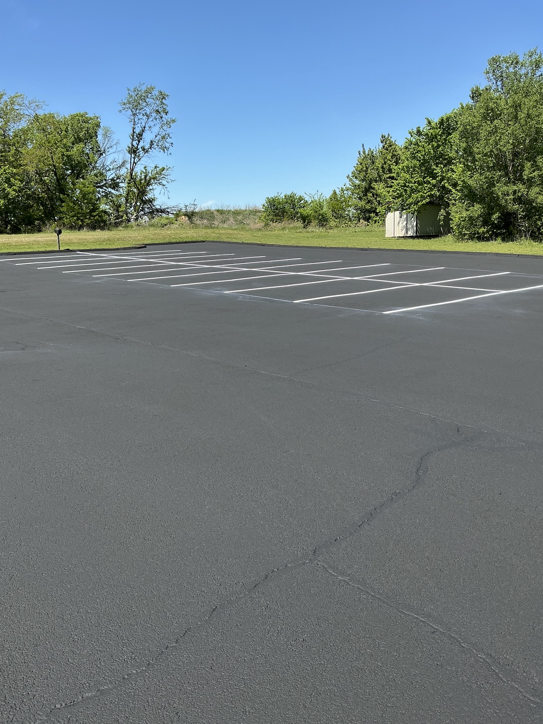 Mercy Family Clinic Asphalt Curb Repair project photo 4 in Green Forest, AR