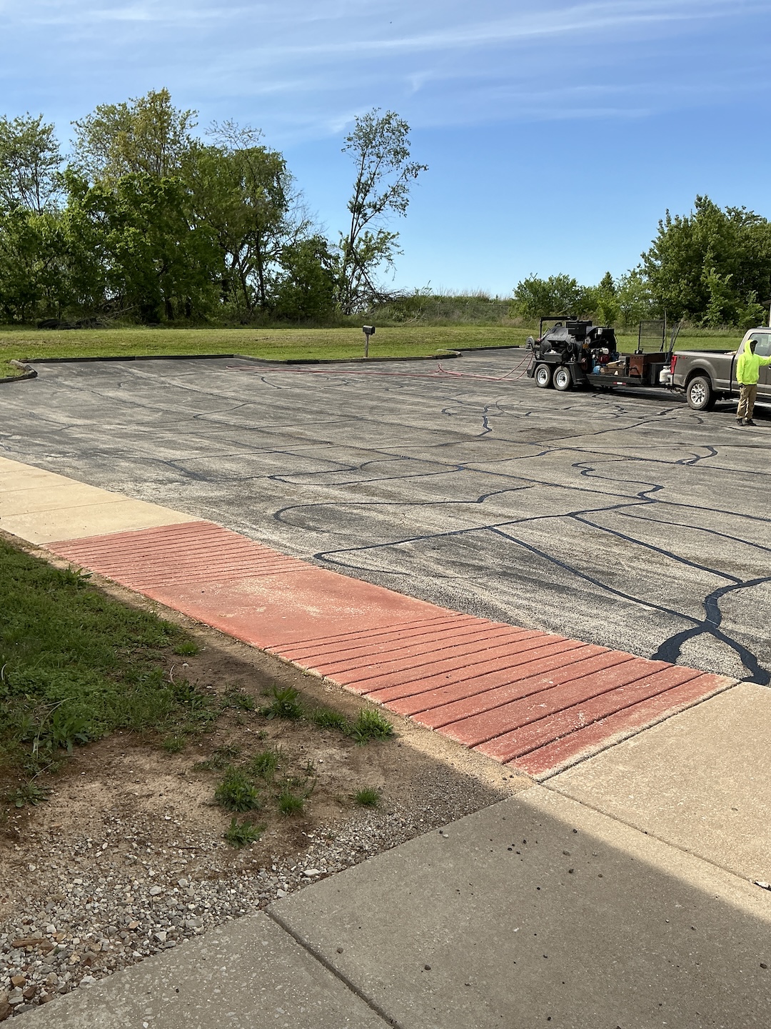 Mercy Family Clinic Asphalt Curb Repair project photo 1 in Green Forest, AR